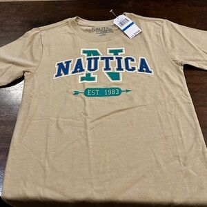 Kids size XL (7) tan Nautica logo tee.